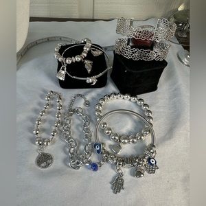 Group of 7 silvertone bracelets